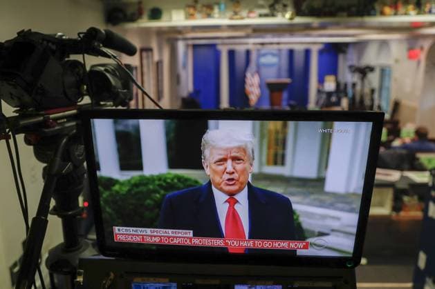 US President Donald J. Trump delivers remarks via Twitter about the violence at the US Capitol on a television screen in the Brady press briefing room at the White House in Washington, DC, on January 6, 2021. Various groups of Trump supporters have broken into the US Capitol and rioted as Congress prepares to meet and certify the results of the 2020 US Presidential election. Pool photo by Shawn Thew  WAX20210106251 SHAWNxTHEW