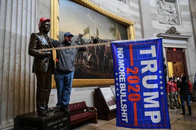 January 6, 2021, Washington, District of Columbia, USA: Pro-Trump mobs storm the US Capitol Wednesday, marauding in hallways, offices and forcing their way into Senate chambers in a stunning attempt to stop the official counting of electoral votes confirming the presidential election the Joe Biden. Washington USA - ZUMA 20210106_mda_l113_197 Copyright: xMiguelxJuarezxLugox