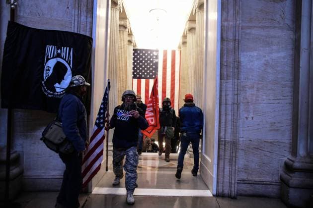 January 6, 2021, Washington, District of Columbia, USA: Pro-Trump mobs storm the US Capitol Wednesday, marauding in hallways, offices and forcing their way into Senate chambers in a stunning attempt to stop the official counting of electoral votes confirming the presidential election the Joe Biden. Washington USA  - ZUMA 20210106_mda_l113_212 Copyright: xMiguelxJuarezxLugox
