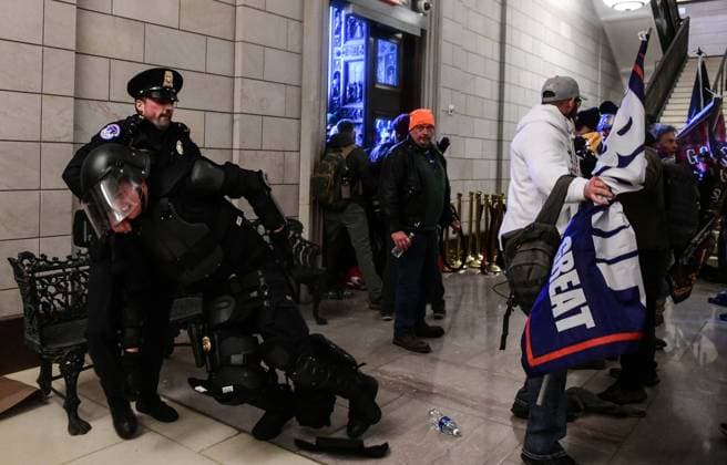 January 6, 2021, Washington, District of Columbia, USA: Pro-Trump mobs storm the US Capitol Wednesday, marauding in hallways, offices and forcing their way into Senate chambers in a stunning attempt to stop the official counting of electoral votes confirming the presidential election the Joe Biden. Washington USA  - ZUMA 20210106_mda_l113_200 Copyright: xMiguelxJuarezxLugox