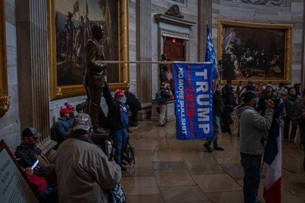 Pro-Trump Supporters Breach The US Capitol Building Pro-Trump protesters inside the US Capitol building. On January 6, 2021, Pro-Trump supporters and far-right forces flooded Washington DC to protest Trump s election loss. Hundreds breached the U.S. Capitol Building, aproximately 13 were arrested and one protester was killed. Washington DC District of Columbia United States Copyright: MichaelxNigro