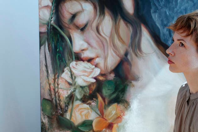 Thoughtful female artist by canvas painting in art studio model released Symbolfoto property released OGF00630