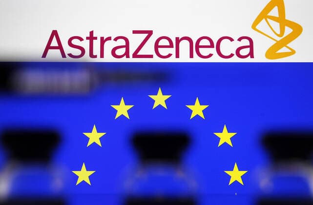 January 13, 2021, Ukraine: In this photo illustration an AstraZeneca logo and EU flag are seen in front of vials and a medical syringe. Ukraine - ZUMAs197 20210113_zaa_s197_001 Copyright: xPavloxGoncharx