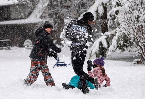 January 16, 2021, Ottawa, on, Canada: Kinsey Sutherland, 13, gets hit with a snowball during a snowball fight with siblings Maxwell, 11, and Elsie, 10, during a major snowstorm in Ottawa on Saturday, Jan. 16, 2021. A snowfall warning is in effect with Environment Canada predicting between 15 to 30 cm of snow by tonight. Ottawa Canada - ZUMAc35_ 20210116_zaf_c35_026 Copyright: xJustinxTangx