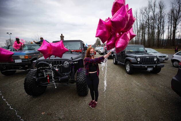 January 17, 2021, Mission, BC, Canada: Rachel Brown holds balloons before riding in an anti-bullying parade of more than 1,000 vehicles in support of a transgender teenager who was allegedly assaulted outside a school, in Mission, B.C., on Sunday, January 17, 2021. According to RCMP two students were arrested and charges were recommended in regards to the incident that was recorded and posted online. Mission Canada - ZUMAc35_ 20210117_zaf_c35_047 Copyright: xDarrylxDyckx