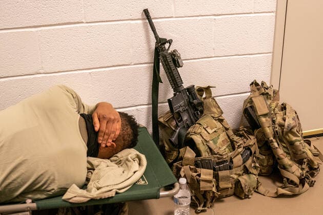 National Guard troops rest up inside the U.S. Capitol ahead of the inauguration for President-elect Joe Biden in Washington, DC on Monday, January 18, 2021. Security is even tighter given the recent events when pro-Trump MAGA mobs breached the security perimeter and penetrated the U.S. Capitol on Jan 6.  WAP20210118518 KenxCedeno
