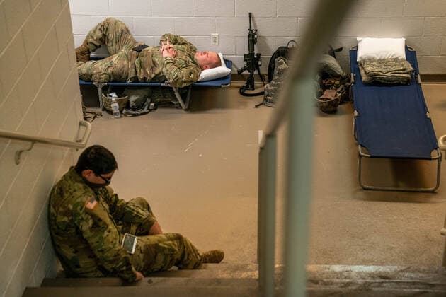 National Guard troops rest up inside the U.S. Capitol ahead of the inauguration for President-elect Joe Biden in Washington, DC on Monday, January 18, 2021. Security is even tighter given the recent events when pro-Trump MAGA mobs breached the security perimeter and penetrated the U.S. Capitol on Jan 6.  WAP20210118525 KenxCedeno