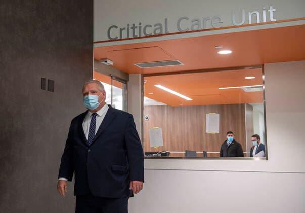 January 18, 2021, Vaughan, on, Canada: Ontario Premier Doug Ford walks out after being given a tour of a digital Intensive Care Unit room at Cortellucci Vaughan Hospital in Vaughan, Ontario on Monday, January 18, 2021. The new hospital is being opened to take patients from other hospitals that are strained by COVID-19. Vaughan Canada  - ZUMAc35_ 20210118_zaf_c35_032 Copyright: xFrankxGunnx