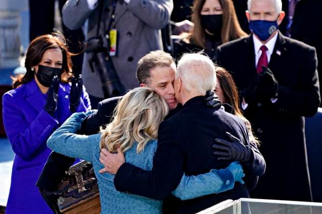January 20, 2021 - Washington, DC, United States: U.S. President Joe Biden, right, is comforted by his son Hunter Biden and First Lady Jill Biden after being sworn in during the 59th presidential inauguration in Washington, D.C., U.S., on Wednesday, Jan. 20, 2021. Biden will propose a broad immigration overhaul on his first day as president, including a shortened pathway to U.S. citizenship for undocumented migrants - a complete reversal from Donald Trump s immigration restrictions and crackdowns, but one that faces major roadblocks in Congress. (Kevin Dietsch CNP Polaris) LagenciaEP 01 20 2021 Washington Washington Spain Copyright: xLagenciaEPx 3527959