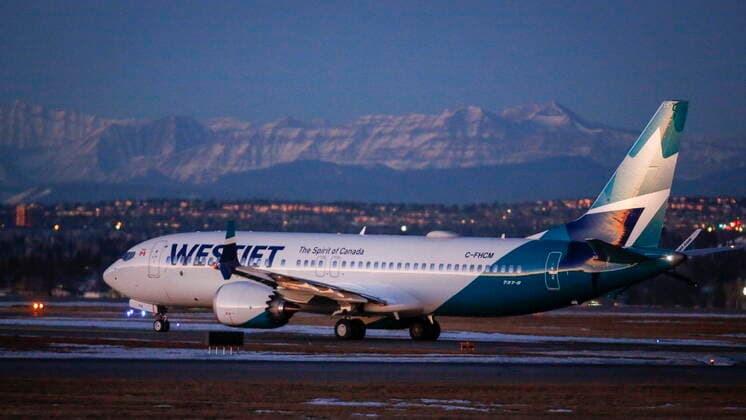 January 21, 2021, Calgary, ab, Canada: The first commercial flight of the Boeing 737 Max in Canada since the aircraft was cleared to fly again in Canadian airspace taxis in Calgary, Alta., Thursday, Jan. 21, 2021. Calgary Canada  - ZUMAc35_ 20210121_zaf_c35_002 Copyright: xJeffxMcintoshx