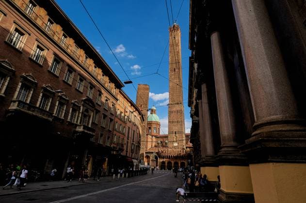 BOLOGNA, ITALY - SEPTEMBER 30, 2019: view of Torre Garisenda and Torre Degli Asinelli leaning towers Due Torri. Meaning Two towers Copyright: xVitaliixKliuiev(Vitleo)x