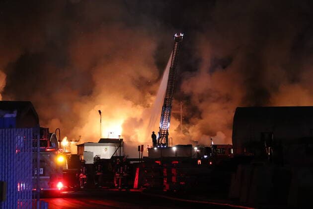 January 23, 2021, Surrey, BC, Canada: Firefighters attend the scene of a fire at AE Concrete in Surrey, B.C. early morning on Saturday Jan. 23, 2021. The three alarm was called bringing over 30 firefighters to the scene. Surrey Canada  - ZUMAc35_ 20210123_zaf_c35_016 Copyright: xShanexMackichanx