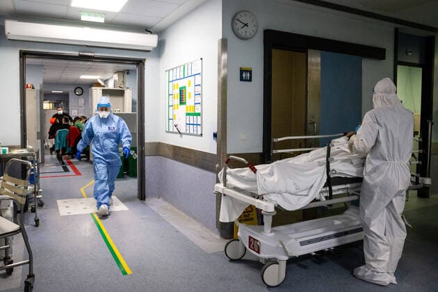 January 23, 2021, Porto, Portugal: A health worker wearing a protective suit attends to an infected patient in a ward at the University Hospital of Sao Joao do Porto..The University Hospital of Sao Joao do Porto, a central hospital in the northern region, receives patients with Covid-19. Portugal currently has 609,136 confirmed cases, 441,556 recoveries and 9,920 death, making it the worst country in the world with the most new cases per million inhabitants. Porto Portugal - ZUMAs197 20210123_zaa_s197_231 Copyright: xRitaxFranÃAx