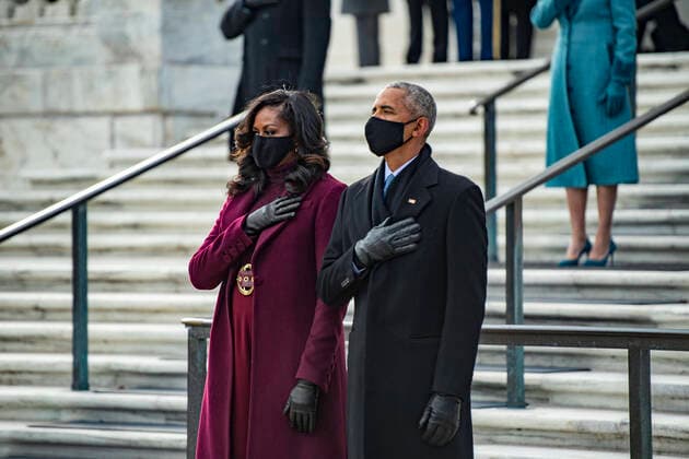 United States of America: Former President Barack Obama and former First Lady Michelle Obama, stand for the national anthem during a wreath ceremony at Arlington National Cemetery, part of the 59th Presidential Inauguration events January 20, 2021 in Arlington, Virginia. Arlington United States of America - ZUMAp138 20210120_zaa_p138_107 Copyright: xElizabethxFraser Dodx