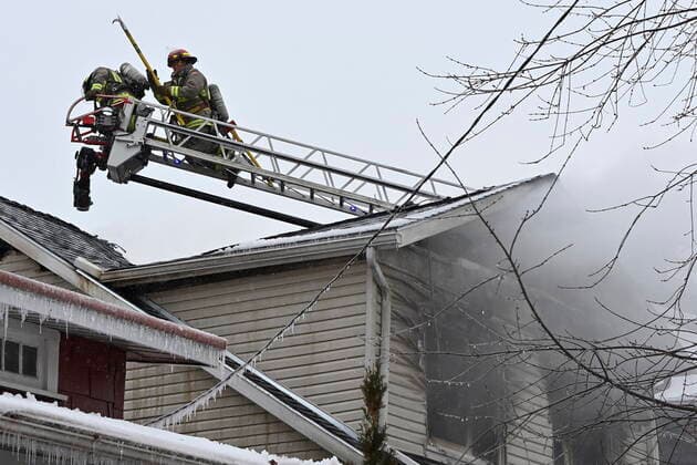 January 29, 2021, Toronto, on, Canada: Firefighters work to put out a house fire in Toronto, Friday, Jan.29, 2021. Fire ripped through an east-end Toronto home early Friday killing four people and injuring several others. Toronto Canada  - ZUMAc35_ 20210129_zaf_c35_004 Copyright: xThexCanadianxPressx
