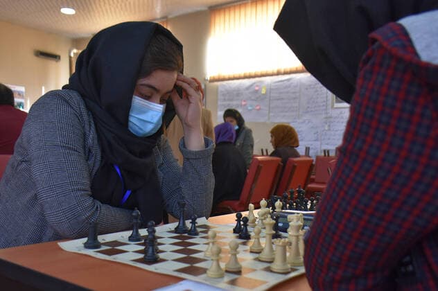 (210129) -- MAZAR-E-SHARIF, Jan. 29, 2021 -- A girl takes part in a chess competition organized by Zahra Ebrahimi in Mazar-e-Sharif, capital of northern Balkh province, Afghanistan, Jan. 20, 2021. The COVID-19 related quarantines have not restricted the life of Zahra Ebrahimi in Afghanistan s northern Mazar-e-Sharif city, as she beat her isolated quarantine life and encouraged girls to learn chess in the relatively peaceful city in Afghanistan. TO GO WITH Feature: Chess playing gets popularity among women during COVID-19 in Afghanistan (Photo by Xinhua) AFGHANISTAN-BALKH-CHESS PLAYING KawaxBasharat 