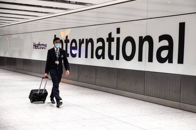 January 30, 2021, London, United Kingdom: A pilot from the British Airways wearing a face mask arrive at the Heathrow international arrival hall. London United Kingdom - ZUMAs197 20210130_zaa_s197_007 Copyright: xMayxJamesx