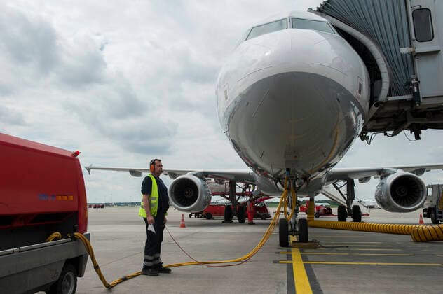 Germany, Lufthansa biofuel GERMANY, Hamburg airport , trial phase with biofuel , Lufthansa jet Airbus A321 , one turbine is powered with 50 percent biofuel a blend of Jatropha , Camelina oil and animal grease