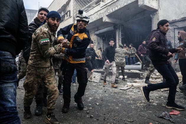 Bilder des Jahres 2021, News 01 Januar News Themen der Woche KW04 January 31, 2021, Aleppo, Aleppo, Syrian Arab Republic: Rescue workers carry away a victim at the scene of an explosion in the town of Azaz in the rebel-controlled northern countryside of Syria s Aleppo province, on January 31, 2021. A car bomb killed at least six people, including three civilians, in the Turkish-held northern town of Azaz in war-torn Syria today, a war monitor said. The attack, which occurred near a cultural centre, also wounded more than 22 others, the Britain-based Syrian Observatory for Human Rights said Aleppo Syrian Arab Republic - ZUMAap3_ 20210131_zaf_ap3_028 Copyright: xNayefxAlaboudx