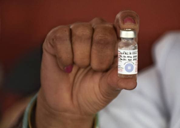 Three-day Polio Vaccination Drive Begins In India A Health worker showing a vial polio vaccine at a housing society on January 31, 2021 in Jammu, India is observing Polio National Immunization Day (NID) today where drops are administered to children of less than 5 years of age to keep the disease at bay. The health ministry said that pulse polio immunization will be taken up on January 31, February 1 and 2. (Photo by Bikas Bhagat INA Photo Agency) 