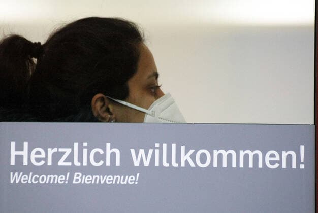 Deutsch Bahn , Railway , Trains , Passengers with Safety Mask FFP2 in the Nurnberg Hauptbahnof during the Hard Lockdown of the Covid 19 Coronavirus Pandemie in Nurnberg Nuremberg , Bayern , Deutschland . February 02 , 2021.