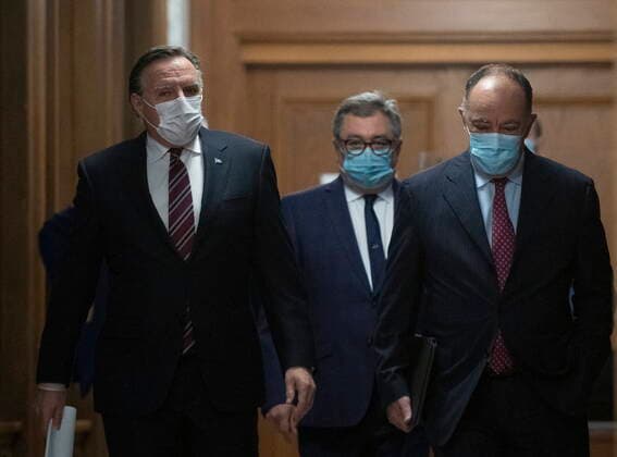 February 2, 2021, Quebec, PQ, Canada: Quebec Premier Francois Legault, from the left, Horacio Arruda, Quebec director of National Public Health and Quebec Health Minister Christian Dube walk to a news conference on the COVID-19 pandemic, Tuesday, February 2, 2021 at the legislature in Quebec City. Quebec Canada - ZUMAc35_ 20210202_zaf_c35_053 Copyright: xJacquesxBoissinotx
