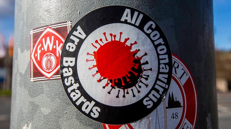 Wuerzburg, Talavera, 04.02.2021, Die Corona-Mutation aus Grossbritanien und ihr Einfluss auf die Jahrhundert-Pandemie Bild: Ein Aufkleber auf welchem All Coronavirus are Bastards steht und auf einem Lichtpfahl geklebt wurde Copyright: HMBxMedia JulienxBecker