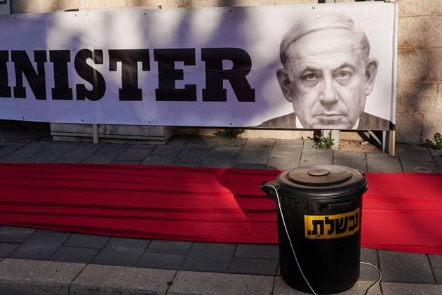 February 8, 2021, Jerusalem, Israel: Crime Minister anti Netanyahu activists lay a red carpet and conduct a mock cleanup operation to Ã¢â‚¬Ëœclean up corruptionÃ¢â‚¬â ¢ and demand PMÃ¢â‚¬â ¢s resignation at the Prime MinisterÃ¢â‚¬â ¢s Residence in Jerusalem. NetanyahuÃ¢â‚¬â ¢s trial begins later today with a hearing he is required to attend at the Jerusalem District Court focusing on his response to the criminal indictment against him. IsraelÃ¢â‚¬â ¢s first serving prime minister to go on criminal trial faces charges of bribery, fraud and breach of trust ahead of 23rd March, 2021 elections. Jerusalem Israel - ZUMAa126 20210208_zap_a126_014 Copyright: xNirxAlonx