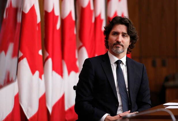 February 16, 2021, Ottawa, on, Canada: Prime Minister Justin Trudeau listens at a press conference in Ottawa on Tuesday, Feb. 16, 2021. Ottawa Canada  - ZUMAc35_ 20210216_zaf_c35_040 Copyright: xPatrickxDoylex