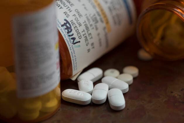 February 16, 2021, Canton, GA, USA: Prescription opioid drugs to control pain lay scattered on a patientÃ¢â‚¬â ¢s nightstand. .The nationÃ¢â‚¬â ¢s opioid epidemic has grown into a much more complicated and deadly drug overdose epidemic, much of it doe to the COIVID-19 crisis. Ã¢â‚¬oeThe disruption to daily life due to the COVID-19 pandemic has hit those with substance use disorder hard,Ã¢â‚¬Â said CDC Director Robert Redfield, M.D. Ã¢â‚¬oeAs we continue the fight to end this pandemic, itÃ¢â‚¬â ¢s important to not lose sight of different groups being affected in other ways. We need to take care of people suffering from unintended consequences.Ã¢â‚¬Â.In 2020, The CDC said reported deaths from drug overdose in the USA reached an all-time hi - ZUMAn03_ 20210216_zaf_n03_007 Copyright: xRobinxRaynex
