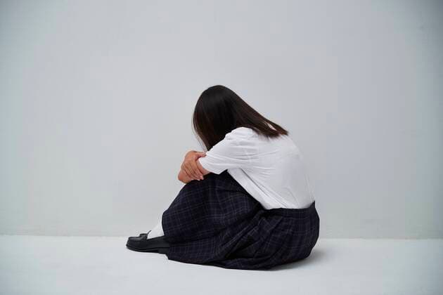 Creative Highlights Symbolbilder Depressed Japanese junior high schoolgirl 147068261  (147068261) ,model released, Symbolfoto