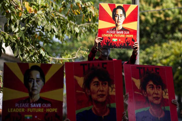 February 13, 2021, Yangon, Myanmar: Protesters hold the placards of Aung San Suu Kyi during the demonstration against the military coup. A massive crowd took to the streets of Yangon to protest against the coup and demanded the release of Aung San Suu Kyi as the government cut off the internet. Myanmar s military detained State Counsellor of Myanmar Aung San Suu Kyi on February 01, 2021 and declared a state of emergency while seizing the power in the country for a year after losing the election against the National League for Democracy (NLD). Yangon Myanmar  - ZUMAotes 20210213_mda_t228_274 Copyright: xThuyaxZawx