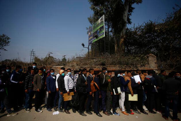 News Bilder des Tages February 17, 2021, Kathmandu, Nepal: People stand in queue for countless hours for an interview to work in gulf countries in a free visa in Kathmandu, Nepal on Wednesday, February 16, 2021. Kathmandu Nepal - ZUMAg200 20210217_zap_g200_003 Copyright: xSkandaxGautamx