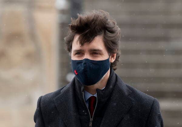 February 19, 2021, Ottawa, on, Canada: Prime Minister Justin Trudeau makes his way to a news news conference in Ottawa, Friday, Feb. 19, 2021. Ottawa Canada  - ZUMAc35_ 20210219_zaf_c35_010 Copyright: xAdrianxWyldx