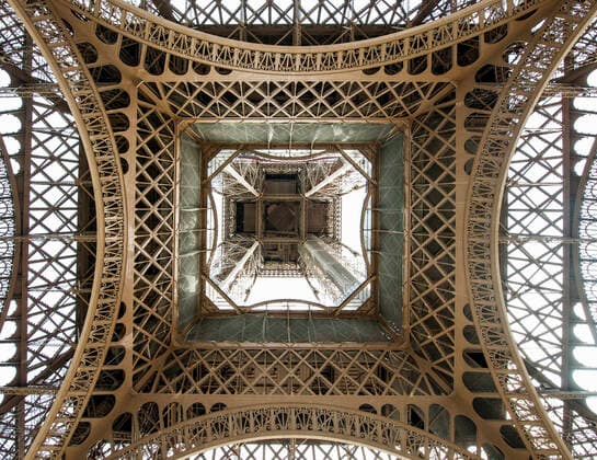 The Eiffel Tower in Paris from below France, Île-de-France, Paris CR_THHE210219-657278-01