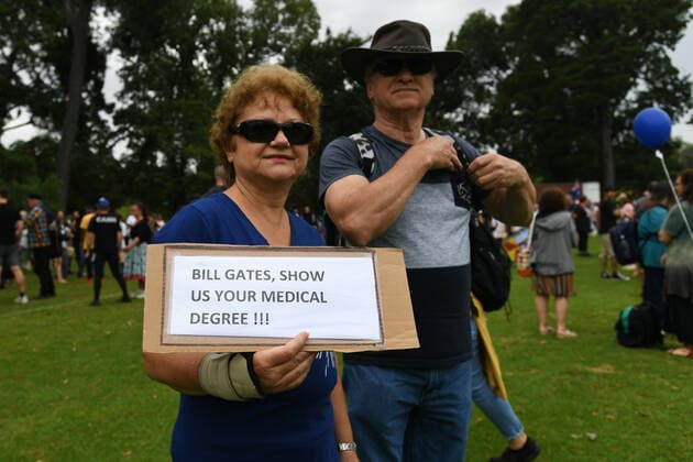 ANTI VACCINATION RALLY MELBOURNE, Protesters are seen during an anti-vaccination rally in Melbourne, Saturday, February 20, 2021. The national rollout of the Pfizer vaccine will begin on Monday in what will be the largest exercise of its kind in Australia s history. ( NO ARCHIVING, EDITORIAL USE ONLY, NO USE IN BOOKS WITHOUT CONSENT MELBOURNE VIC AUSTRALIA  Copyright: xERIKxANDERSONx 20210220001521821563
