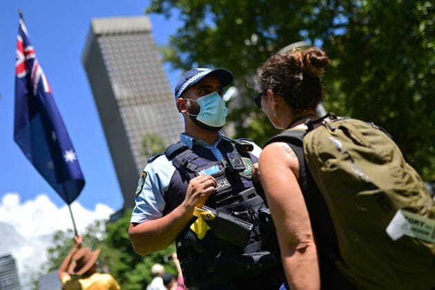 ANTI VACCINATION RALLY SYDNEY, Police officers prevent people from entering an anti-vaccination rally in Sydney, Saturday, February 20, 2021. The national rollout of the Pfizer vaccine will begin on Monday in what will be the largest exercise of its kind in Australia s history. ( NO ARCHIVING, EDITORIAL USE ONLY, NO USE IN BOOKS WITHOUT CONSENT SYDNEY NSW AUSTRALIA  Copyright: xSTEVENxSAPHOREx 20210220001521821896