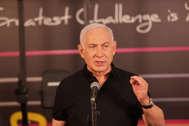 Israeli Prime Minister Benjamin Netanyahu visits a fitness gym ahead of the re-opening of the branch in Petah Tikva, Israel on Saturday, February 20, 2021, Israel continues lifting the lockdown with the opening of gyms, hotels, and shopping centers starting February. 21. Pool photo by Tal Shahar  JERX20210220203 TalxShahar