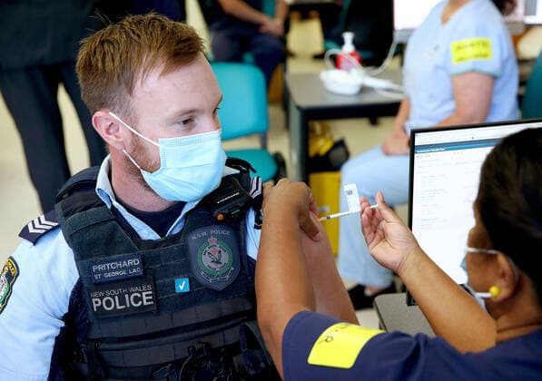 NSW COVID19 VACCINE ROLLOUT, Police officer Lachlan Pritchard was the second person in NSW to receive the Pfizer vaccination at the Royal Prince Alfred Hospital Vaccination Hub in Sydney, Monday, February 22, 2021. Australia will begin its roll out of the Pfizer coronavirus vaccine on Monday, the country s most complicated logistical exercise to date. ( NO ARCHIVING, EDITORIAL USE ONLY, NO USE IN BOOKS WITHOUT CONSENT SYDNEY NSW AUSTRALIA  Copyright: xTobyxZernax 20210222001522255044