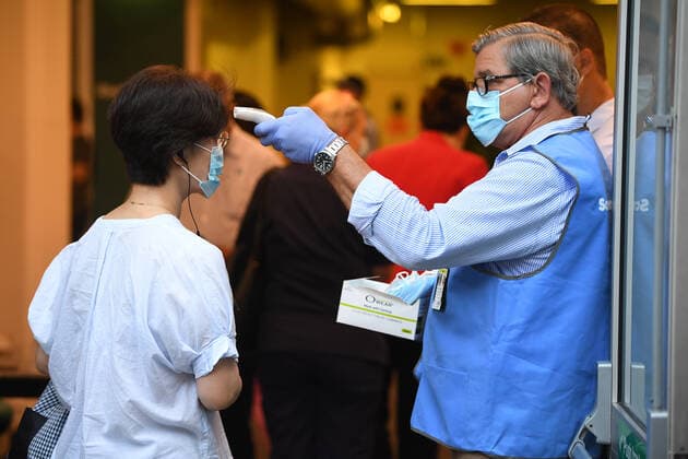 NSW COVID19 VACCINE ROLLOUT, A frontline worker arrives at the start of the COVID-19 vaccination program at Royal Prince Alfred Hospital in Sydney, Monday, February 22, 2021. ( NO ARCHIVING, EDITORIAL USE ONLY, NO USE IN BOOKS WITHOUT CONSENT SYDNEY NSW AUSTRALIA  Copyright: xJOELxCARRETTx 20210222001522259695