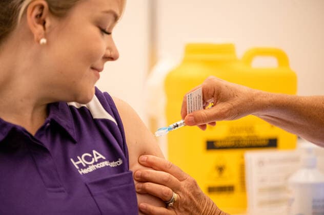 WA COVID19 VACCINE ROLLOUT, Nurse Keita Winks receives the Pfizer coronavirus vaccine at the Hyatt Perth quarantine hotel in Perth, Monday, February 22, 2021. Australia will begin its roll out of the Pfizer coronavirus vaccine on Monday, the country s most complicated logistical exercise to date. ( NO ARCHIVING, EDITORIAL USE ONLY, NO USE IN BOOKS WITHOUT CONSENT PERTH WA AUSTRALIA  Copyright: xJOSHxFERNANDESx 20210222001522345483