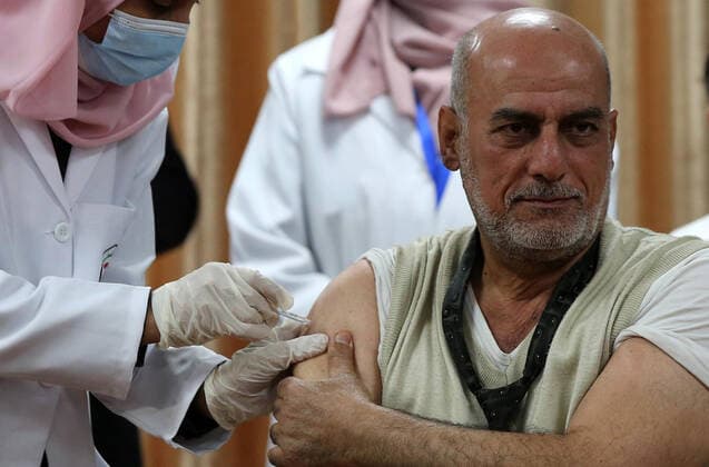 February 22, 2021, Gaza city, Gaza Strip, Palestinian Territory: Palestinian doctors receive the first dose of a COVID-19 vaccine at the Ministry of Health, in Gaza city, on February 22, 2021. Around 20,000 coronavirus vaccine doses from the UAE arrived in Gaza Sunday Gaza city Palestinian Territory - ZUMAap3_ 20210222_zaf_ap3_022 Copyright: xAshrafxAmrax