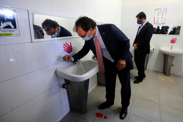 Santiago, February 22, 2021 The Minister of Education, Raul Figueroa, along with the Director of Public Education, Alejandra Grebe and the Superintendent of Education, Cristian ORyan, toured the facilities of the School JosÃ Bernardo Suarez de Macul to supervise the security protocols of the establishment a few days before the  Copyright: JONNATHANxOYARZUN ATONxCHILE