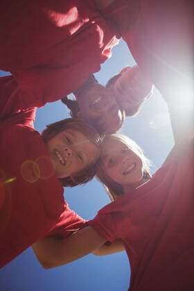 Kids forming huddle in the boot camp Portrait of happy kids forming huddle in the boot camp, model released, , property released, Cape Town, South Africa, 16.03.2017, 1000440.jpg, boot, camp, boot camp, park, sky, sunlight, lens flare, summer, sunny, sportswear, athlete, athletic, sport, sports, standing, smiling, happy, cheerful, forming, huddle, team, teamwork, unity, innocent, innocence, childhood, together, bonding, healthy lifestyle, fit, fitness, wellness, wellbeing, active, activity, healthy, success, successful, endurance, recreation Outdoors,Day