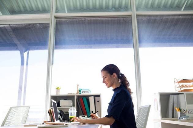 Female executive working over graphic tablet at her desk Female executive working over graphic tablet at her desk in office, model released, , property released, Cape Town, South Africa, 19.03.2017, 1019518.jpg, office, workplace, profession, professional, executive, occupation, job, career, expertise, skill, corporate, business, reliability, company, millennial, lifestyle, smart casual, sitting, holding, smiling, content, working, desk, chair, diary, pen, color swatch, drink, beverage, refreshment, using laptop, laptop, notebook, computer, wireless technology, communication, global communications, connection, graphic designer, designing, artist, designer, graphics tablet, digitizer, stylus, drawing, creating, creative, beautiful 20s, Youn