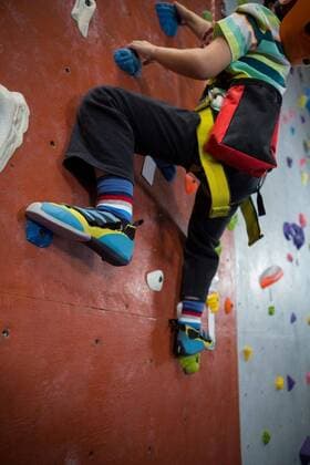 Boy practicing rock climbing in fitness studio Low-section of boy practicing rock climbing in fitness studio, model released, , property released, Cape Town, South Africa, 2017-05-09T23:00:00.000Z, 1051681.jpg, athlete, athletic, casual clothing, safety harness, funny pack, equipment, rope, bouldering, clambering, indoor climbing, rock climbing, sport, sporty, sportive, sports shoes, climbing, practice, training, active, wall, indoor activity, gym, gymnasium, fitness studio, fit, fitness, wellness, wellbeing, recreation, adventure, extreme, healthy lifestyle, physical, childhood, modern, leisure Child, Boy, Male, Caucasian, 6-7 Years, Boys, Caucasian Ethnicity Indoors