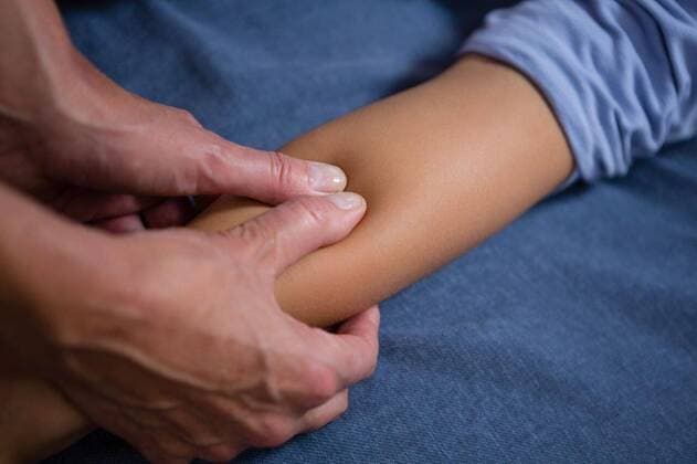 Physiotherapist giving hand massage to patient Physiotherapist giving hand massage to patient in clinic, model released, , property released, Cape Town, South Africa, 2017-04-22T23:00:00.000Z, 1052822.jpg, medical, clinic, hospital, practitioner, doctor, specialist, physio, therapist, physical therapist, physiotherapy, physiotherapist, osteopath, orthopedic, patient, lying, casual clothing, consultation, consulting, assistance, assisting, guidance, bandage, treatment, pressing, pressure, massage, hand massage, massaging, illness, recovery, health, health service, bodycare, healthcare, healthcare and medicine, expertise, profession, professional Child, Girl, Female, Caucasian, 50s, Mature Adult, Woman, 6-7 Years, Girls, Caucasian Ethnicity,
