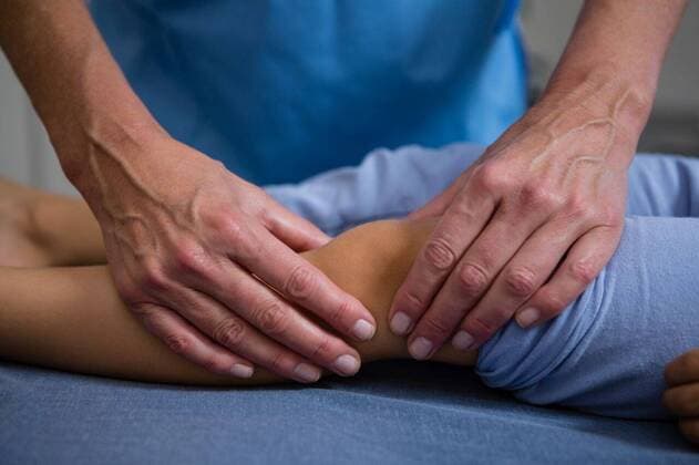 Physiotherapist giving leg massage to patient Physiotherapist giving leg massage to patient in clinic, model released, , property released, Cape Town, South Africa, 2017-04-22T23:00:00.000Z, 1052823.jpg, medical, clinic, hospital, practitioner, doctor, specialist, physio, therapist, physical therapist, physiotherapy, physiotherapist, osteopath, orthopedic, patient, lying, casual clothing, consultation, consulting, assistance, assisting, guidance, bandage, treatment, pressing, pressure, massage, injured, injury, knee, leg, pain, illness, wellness, care, cure, massaging, recovery, health, health service, bodycare, healthcare, healthcare and medicine, expertise, profession, professional Child, Girl, Female, Caucasian, 50s, Mature Adult, Woman