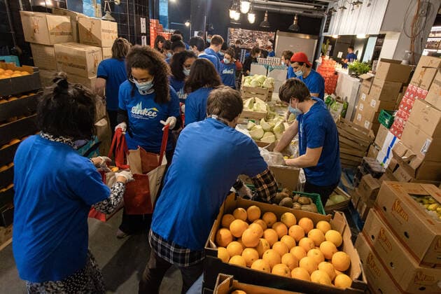 (210222) -- PARIS, Feb. 22, 2021 -- Volunteers distribute free food to people in precarious situations during the COVID-19 pandemic in Paris, France, on Feb. 22, 2021. (Photo by Xinhua) FRANCE-PARIS-COVID-19-FREE FOOD-DISTRIBUTION AurelienxMorissard