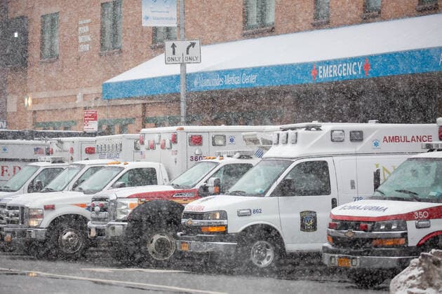 (210223) -- NEW YORK, Feb. 23, 2021 -- Ambulances park in front of Maimonides Medical Center in the Brooklyn Borough of New York, the United States, Feb. 22, 2021. The United States reached the grim milestone of half a million coronavirus deaths on Monday, according to the Center for Systems Science and Engineering (CSSE) at Johns Hopkins University. (Photo by Xinhua) U.S.-NEW YORK-COVID-19-DEATH-HALF A MILLION MichaelxNagle 